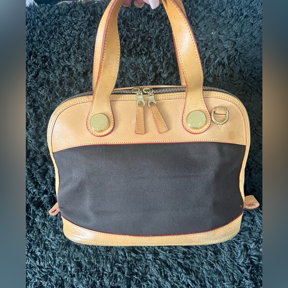 VINTAGE DOONEY & BOURKE CABRIOLET